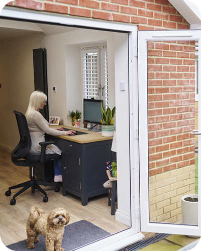 Female working from home with dog