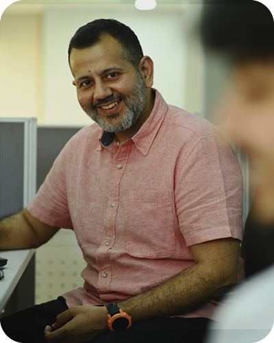Male colleague smiling at camera