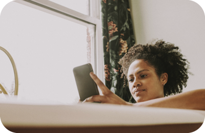 Female sat on mobile